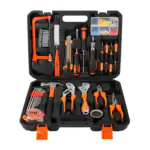 Open black and orange hardware hand toolbox with organized hand tools including hammer, wrenches, pliers, screwdrivers, hacksaw, tape measure, and a small faste…