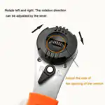 Close-up of adjustable ratchet wrench head showing direction lever, open/close markings, and instructional text labels